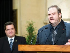 “There’s no way this reform will accomplish what it’s supposed to do, it will do the exact opposite, actually,” says Benoit Dorais, head of Coalition Montréal and Sud-Ouest borough mayor. He is seen here next to Montreal Mayor Denis Coderre, left, during a ceremony at city hall on Feb. 24.