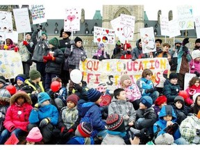 This 2012 photo shows a gathering on Parliament Hill in Ottawa to draw attention to the lack of education funding and opportunities for First Nations children.