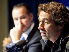 This file photo shows Montreal Impact sporting director Nick De Santis, right, and president Joey Saputo during happier times at an end-of-season press conference in Montreal on Oct. 31, 2012.