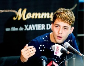 Xavier Dolan talks about winning the Jury Prize at Cannes Film Festival for Mommy at a news conference in May.