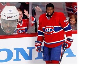 A young fan tries to get the attention of Montreal Canadiens defenceman P.K. Subban as he takes part in the pre game skate during game 5 NHL Eastern Conference action against the New York Rangers at the Bell Centre in Montreal on Tuesday May 27, 2014.