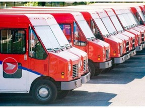 In a 2013 report, the Conference Board of Canada said that Canada Post’s falling mail volumes could create a $1 billion deficit by 2020. The report stated that eliminating door-to-door service could cut that deficit by $576 million. Graham Hughes/CANADIAN PRESS FILES