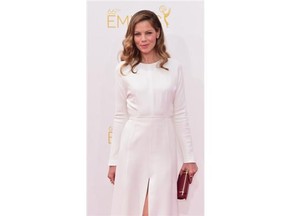 Actress Michelle Monaghan arrives on the red carpet for the 66th Emmy Awards, August 25, 2014 at Nokia Theatre in Los Angeles, California.