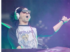 American electronic music artist Skrillex performs on the first day of the 2014 Osheaga Music Festival at Jean-Drapeau Park in Montreal on Friday.