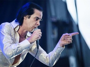 Australian musician Nick Cave performs for the 2014 Osheaga Music Festival at Jean-Drapeau Park in Montreal on Saturday.