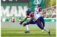 Brandon Whitaker fumbles the ball in the first half at Mosaic Stadium in Regina on Saturday.