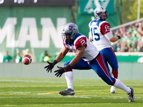 Brandon Whitaker #2 of the Montreal Alouettes fumbles the ball in the first half in a game between the Montreal Alouettes and Saskatchewan Roughriders at Mosaic Stadium on Aug. 16, 2014 in Regina.