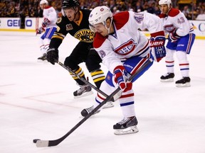 BOSTON, MA - MARCH 24: Daniel Briere #48 of the Montreal Canadiens carries the puck out of the defensive zone in the first period against the Boston Bruins during the game at TD Garden on March 24, 2014 in Boston, Massachusetts.  (Photo by Jared Wickerham/Getty Images)