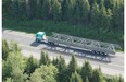 File photo from June 2007. Steel manufacturer Canam transports a long joists