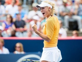 Caroline Wozniacki of Denmark reacts after scoring a point against Serena Williams of USA during their quarterfinals tennis match for the 2014 Rogers Cup women’s tennis tournament at Uniprix Stadium in Montreal on Friday, August 8, 2014.