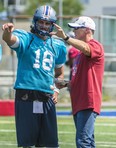 It seems like only a matter of time before Jonathan Crompton, seen here with QB coach Jeff Garcia, receives some playing time for the Als.
Photo courtesy of Montreal Alouettes
