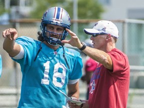 It seems like only a matter of time before Jonathan Crompton, seen here with QB coach Jeff Garcia, receives some playing time for the Als.
Photo courtesy of Montreal Alouettes