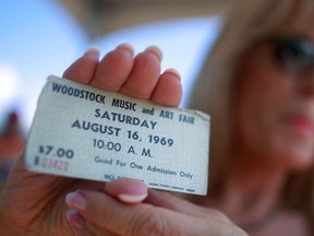 Janet Huey holds her original concert ticket as the 40th anniversary of the Woodstock music festival approaches August 14, 2009 in Bethel, New York. On August 15-17 in 1969 an estimated 400,000 music fans gathered on Max Yasgur's farm in Bethel, N.Y. for the celebrated music festival.  (Mario Tama/Getty Images)