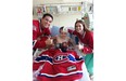 Rob Hing and his wife, Alayne, visit 13-year-old Alex Smidt, who is battling meningitis, at the Alberta Children’s Hospital in Calgary. Smidt’s story touched Habs fans on The Gazette’s hockeyinsideout.com website, resulting in Hing and his wife deciding to visit the boy from Regina they had never met and bring him some Habs goodies to help cheer him up.