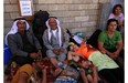 Iraqi Christians who fled the violence in the village of Qaraqush, about 30 kilometres east of the northern province of Nineveh, rest upon their arrival at the Saint-Joseph church in the Kurdish city of Arbil, in Iraq’s autonomous Kurdistan region, on August 7, 2014. Gunmen from the Sunni Muslim Islamic State (IS) seized Qaraqosh, Iraq’s largest Christian town, and several others near Mosul following the withdrawal of Kurdish peshmerga fighters, inhabitants said.