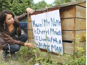 Kahnawake resident Cheryl Diabo found a sign in her driveway saying she lives with a white man. Kahnawake Mohawks who marry non-natives risk being evicted from the community under a controversial law.