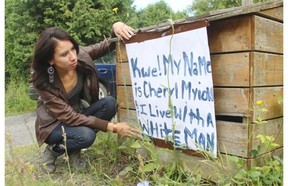 Kahnawake resident Cheryl Diabo found a sign in her driveway saying she lives with a white man. Kahnawake Mohawks who marry non-natives risk being evicted from the community under a controversial law.