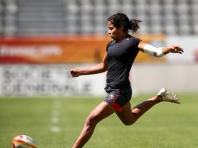 PARIS, FRANCE - AUGUST 16:  Magali Harvey kicks during the Canada Captain's Run for the IRB Women's Rugby World Cup 2014 at Stade Jean Bouin on August 16, 2014 in Paris, France.  (Photo by Jordan Mansfield/Getty Images)