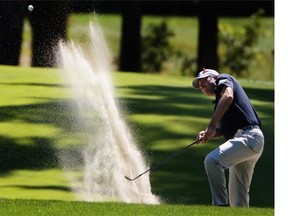 Matt Kuchar takes his fourth shot on the seventh hole during the second round of the Deutsche Bank Championship at the TPC Boston on Saturday in Norton, Mass.