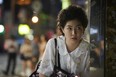 In this scene from the South Korean comedy Miss Granny, Shim Eun-kyung's character, Oh Doo-ri,  has a young face, but she hasn't yet abandoned her old-lady perm. (CJ Entertainment)