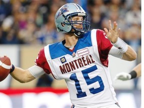Montreal Alouettes’ quarterback Alex Brink (15) throws during the first half of CFL action against the Winnipeg Blue Bombers in Winnipeg on Friday.