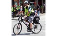 Montreal police switched to camo pants and red caps  from their traditional uniforms to protest proposed pension fund modifications by the Couillard government.