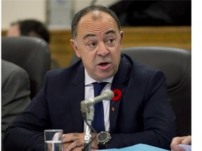 Former CAQ finance critic Christian Dubé speaks at a legislature committee on November 5, 2013 at the legislature in Quebec City.