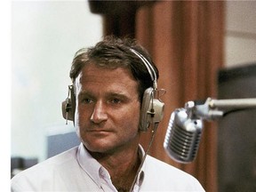 This 1987 file photo released by Touchstone Pictures shows actor Robin Williams in character as disc-jockey Adrian Cronauer in director Barry Levinsons comedy drama, "Good Morning Vietnam." Williams, whose free-form comedy and adept impressions dazzled audiences for decades, has died in an apparent suicide. He was 63. (AP Photo/Touchstone Pictures)