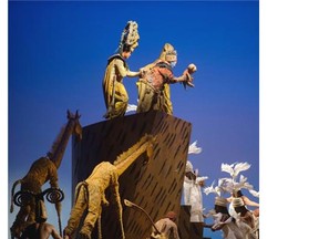 The opening scene of the Lion King, being presented at Place des Arts till Sept. 7.