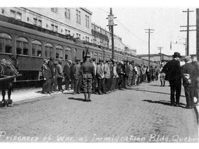 “Enemy aliens” prepare to board a train in Montreal, circa 1914: They would have been sent to an internment camp, most likely in Ontario, where they would have been forced to do heavy labour. Courtesy of the Canadian First World War Internment Recognition Fund, Humphrey Collection.
