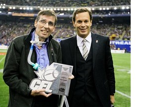 Tony Proudfoot was posthumously nominated for a National Newspaper Award in the sports reporting category March 21, 2011.Here,  Canadian Football League commissioner Mark Cohon (right) presents the Hugh Campbell Distinguished Leadershiop Award to former Montreal Alouette Tony Proudfoot prior to the Eastern Final between the Montreal Alouettes and Toronto Argonauts in Montreal on Nov.21, 2010.