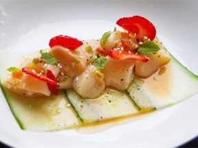 The scallop ceviche is served with strawberry, cucumber, and a touch of mint and ginger at Cafeden.