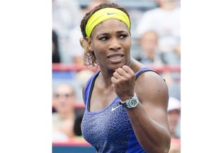 Serena Williams of USA reacts after scoring a point against Caroline Wozniacki of Denmark during their quarterfinals tennis match for the 2014 Rogers Cup women’s tennis tournament at Uniprix Stadium in Montreal on Friday, Aug. 8, 2014.