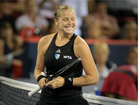 American Shelby Rogers celebtrates her upset victory over Eugenie Bouchard at the Rogers Cup tennis tournament in Montreal Tuesday August 05, 2014.