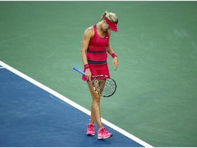 Eugenie Bouchard of Canada looks downward after losing a point during her match against Svetlana Kuznetsova on day 5 at Western & Southern Open on August 13, 2014 at the Linder Family Tennis Center in Cincinnati. Bouchard lost to Kuznetsova, 6-4, 3-6, 6-2.