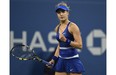 Eugenie Bouchard of Canada pumps her fist while playing Sorana Cirstea of Romania during their U.S. Open 2014 women's singles match at the USTA Billie Jean King National Center August 28, 2014  in New York.