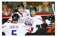 Team Orr’s Josh Ho-Sang, right, celebrates his goal with teammate Alex Peters, centre, during the CHL Top Prospects hockey action against Team Cherry in Calgary in January.