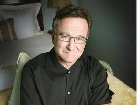 This June 15, 2007, file photo shows actor and comedian Robin Williams posing to promote his film License To Wed. Williams, whose free-form comedy and adept impressions dazzled audiences for decades, has died in an apparent suicide. He was 63.