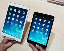 This October 22, 2013 file photo shows Apple’s iPad Air (L) and iPad Mini tablets in San Francisco, California. Apple’s suppliers are preparing to manufacture the largest-ever iPad, with production scheduled to commence by early next year.