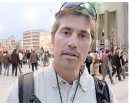 This undated file still image from video released April 7, 2011, by GlobalPost, shows James Foley of Rochester, N.H., a freelance contributor for GlobalPost, in Benghazi, Libya. In a horrifying act of revenge for U.S. airstrikes in northern Iraq, militants with the Islamic State extremist group have beheaded Foley — and are threatening to kill another hostage, U.S. officials say.