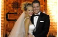 Canadian crooner Michael Buble and his bride, Argentine TV star Luisana Lopilato, posing after their wedding in Buenos Aires. After the religious ceremony the newlyweds offered a party for 300 in the outskirts of the Argentine capital.