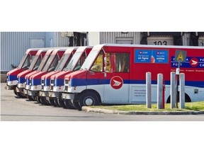 Trucks are parked at a sorting plant in Ville St Laurent in this 2011 file photo.