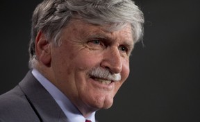 Senator Romeo Dallaire smiles as he answers a question on his retirement from the Senate during a news conference on Parliament Hill Wednesday May 28, 2014 in Ottawa. THE CANADIAN PRESS/Adrian Wyld