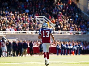 Alouettes quarterback Anthony Calvillo runs off the field during the first half of their CFL football match against the Winnipeg Blue Bombers in Montreal on Monday, October 8, 2012.