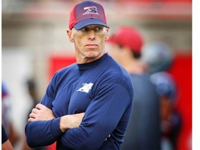 Alouettes quarterbacks coach Jeff Garcia watches warm-up prior to Canadian Football League game against the Ottawa Redblacks in Montreal Friday August 29, 2014.