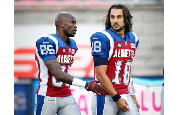 Chad Johnson visits Bengals training camp, leaps into Higgins' arms