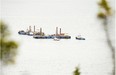 Barges conduct seismic tests in the St-Lawrence river, off Cacouna village, Sept. 23, 2014, to build an oil terminal for TransCanada that would start operating in 2018.