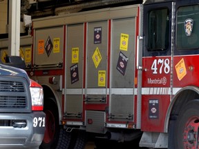 Anti Bill 3 stickers cover firetruck at the Pointe-Claire station on St-Jean Blvd.