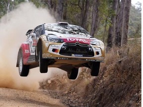 British rally driver Kris Meeke jumps his Citroen over a brow during the fifth special stage of the World Rally Championship (WRC) Rally of Australia, near Bellingen on the New South Wales central coast on September 12, 2014.