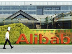 A chef walks in the headquarter campus of Alibaba Group in Hangzhou in eastern China's Zhejiang province. As Chinese e-commerce powerhouse Alibaba readiesdwhat could be the biggest initial public offering ever on the New York Stock Exchange, it is hinted at plans to expand into the U.S.